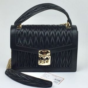 MIU MIU Confidential Matelassé Quilted Lam…